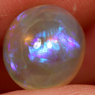 SOLID CRYSTAL OPAL Large opal with bright blue and purple rolling flashes